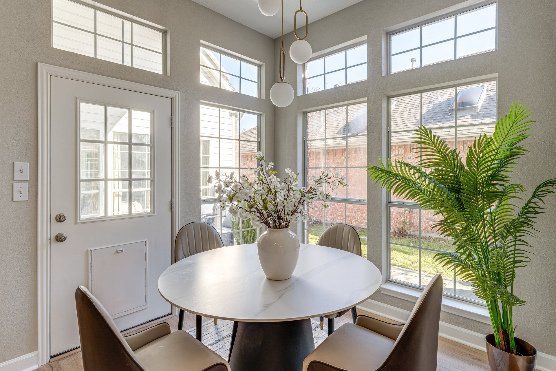 Bright dining area set for family-style meals